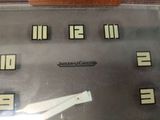 a picture of a clock with numbers on it