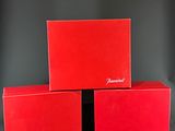 three red boxes are stacked on top of each other