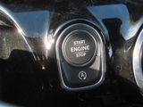 a close up of the start engine button on a car