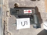 a picture of a stapler with a piece of paper attached to it