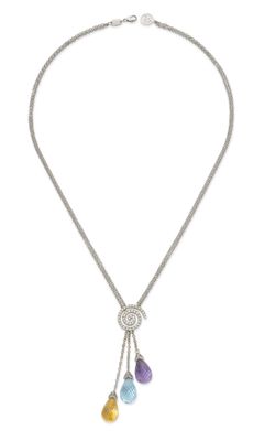 a close up of a necklace on a white background