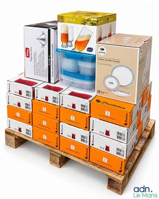 boxes stacked on a pallet with lids and lids on them