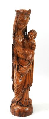 an image of a statue of a woman holding a child