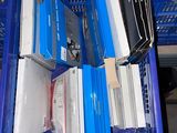 a blue crate with a bunch of electronic equipment in it