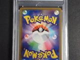 a close up of a pokemon card on a table
