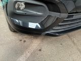 a close up of the front of a black car