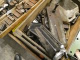 a wooden box filled with tools and a pair of shoes