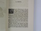 an open book with a red bookmark on it