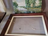 two framed paintings of trees and a river in a wooden frame