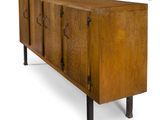 the sideboard is made of wood and has metal handles