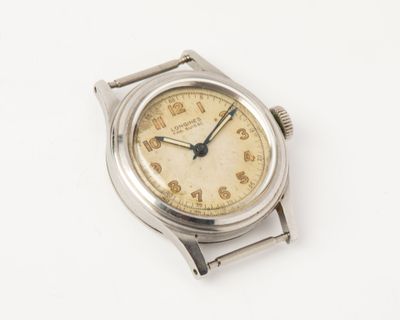 an image of a silver wrist watch on a white surface