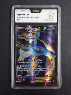 a close up of a pokemon card in a plastic case