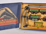 a box with a train set in it on a table