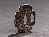 a close up of a small metal object on a table