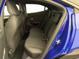 a blue car that is sitting in the back of the car