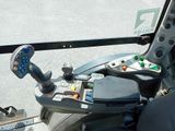 a control panel in the cockpit of a bus