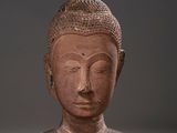 statue of a head of a person with a hat on