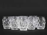 set of six crystal tumblers on a black background
