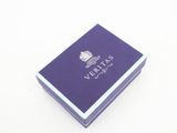 purple box with a white logo on it on a white surface