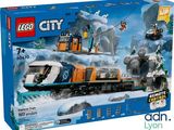 a box of lego city set with a train on the tracks