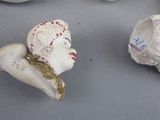 three figurines that are sitting on a table