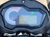 a close up of a motorcycle with a speedometer on it