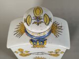 a white box with a blue and yellow design on it