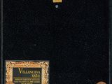 a black box with a gold label on it sitting on top of a table