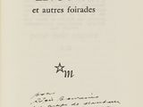an open book with a black and white image of a bird on it