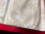 a white bag that is sitting on top of a table