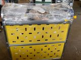 a cart that has many items on it in a warehouse