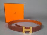 a close up of a belt with a box in the background