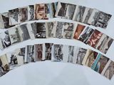 a lot of old photos on a white surface