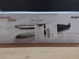 packaging of the babylis advanced steam curling system on a table