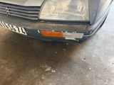a picture of a car that is parked in a garage