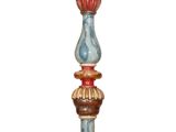 an image of a tall candle holder made of wood and painted with red, white, and blue colors