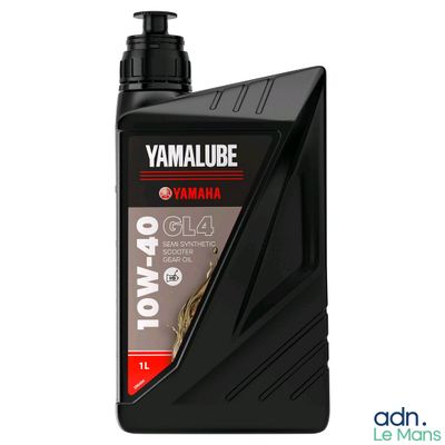un gros plan d'une bouteille d'huile Yamaha sur fond blanc