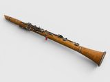 a close up of a bassoon on a white surface