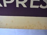 a sign that says express on the side of a building
