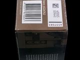 a box of chocolate sitting on a black surface