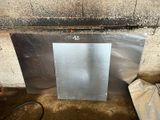 a picture of a piece of metal sitting on the ground