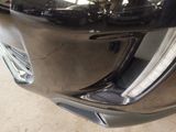 a close up of the front bumper of a car