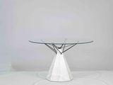 a white table with a glass top on a white surface