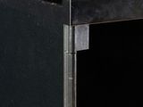 an image of a black and chrome desk with a glass top