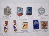 many different types of badges on a piece of paper