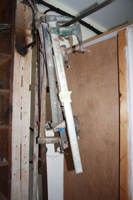 a ladder that is leaning against a wall in a room