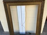 a picture of a picture frame leaning against a wall