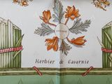 a book with a picture of a flower and a bird on it