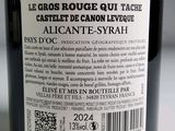 a label on a bottle of wine on a table