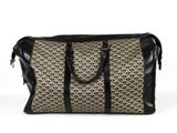 une image représentant un sac noir et blanc orné d'un motif